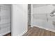 Spacious walk-in closet boasts ample storage with multiple shelves for organization at 3215 Concord Cir, Smyrna, GA 30080
