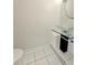 Stylish half bathroom with a glass vessel sink on a modern stand and sleek tile flooring, offering a contemporary design at 3278 Abbeywood Dr, Decatur, GA 30034