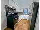Well-equipped kitchen featuring stainless steel appliances, granite countertops, stylish backsplash, and white cabinetry for ample storage at 3278 Abbeywood Dr, Decatur, GA 30034