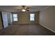 Spacious bedroom with ceiling fan and ample closet space at 535 Toonigh Rd, Woodstock, GA 30188