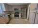 Kitchen with granite countertops and stainless steel appliances at 535 Toonigh Rd, Woodstock, GA 30188