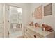 Well-appointed bathroom with pedestal sink and decorative wall art at 273 12Th Ne St # 421, Atlanta, GA 30309