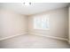 Well-lit bedroom featuring carpeted floors and window with shutters at 10 Ivy Chase Ne, Atlanta, GA 30342