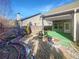 Covered patio with green flooring and a fenced backyard at 3338 Carolina Wren Sw Trl, Marietta, GA 30060