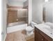 Bathroom with a shower/tub combo and a vanity with a sink at 3338 Carolina Wren Sw Trl, Marietta, GA 30060