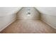Large bonus room with carpet and window at 3338 Carolina Wren Sw Trl, Marietta, GA 30060