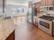 Modern kitchen with stainless steel appliances and granite countertops at 3338 Carolina Wren Sw Trl, Marietta, GA 30060