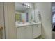 Bathroom featuring double vanity and shower/tub at 1305 Leisure Lake Dr, Lawrenceville, GA 30044