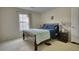 Cozy bedroom with double bed and plenty of natural light at 1305 Leisure Lake Dr, Lawrenceville, GA 30044