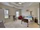 Spacious bedroom with hospital bed, chair, and window views at 1305 Leisure Lake Dr, Lawrenceville, GA 30044