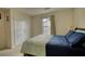 Well-lit bedroom with double bed and ample closet space at 1305 Leisure Lake Dr, Lawrenceville, GA 30044
