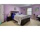 Spacious bedroom with double bed and ample closet space at 1305 Leisure Lake Dr, Lawrenceville, GA 30044