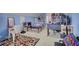 Spacious bonus room with home office and sitting area at 1305 Leisure Lake Dr, Lawrenceville, GA 30044
