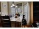 Bright dining room with bay window and seating for four at 1305 Leisure Lake Dr, Lawrenceville, GA 30044
