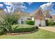 Exterior view of a two-story house with a two-car garage at 1305 Leisure Lake Dr, Lawrenceville, GA 30044