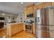 Modern kitchen with stainless steel appliances and ample cabinetry at 1305 Leisure Lake Dr, Lawrenceville, GA 30044