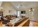 Spacious living room with hardwood floors, fireplace, and plenty of natural light at 1305 Leisure Lake Dr, Lawrenceville, GA 30044
