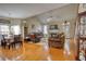 Spacious living room with hardwood floors, fireplace, and high ceilings at 1305 Leisure Lake Dr, Lawrenceville, GA 30044