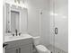 Modern bathroom with grey vanity and walk-in shower at 148 Birch Tree Way, Cumming, GA 30040