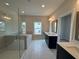 Spa-like bathroom with double sinks, large shower, and garden tub at 148 Birch Tree Way, Cumming, GA 30040