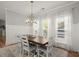 Dining room showcasing a large wooden table and neutral decor at 981 Rittenhouse Way, Atlanta, GA 30316