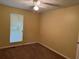 Spacious bedroom with carpet flooring and ceiling fan at 2087 Grove Way, Hampton, GA 30228