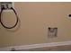 Laundry area with hookups and flooring at 2087 Grove Way, Hampton, GA 30228