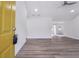 Bright entryway with yellow door and vinyl flooring at 265 Five Oaks Dr, Covington, GA 30014