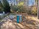 Community playground with swings, slide, and climbing structure at 3509 Billingsley Dr, Marietta, GA 30062