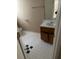 Standard bathroom featuring a vanity, toilet, and a tile floor in a compact layout at , Marietta, GA 30008