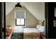 Cozy bedroom with ample natural light, hardwood floors, and neutral tones at 10975 Hutcheson Ferry Rd, Chattahoochee Hills, GA 30268