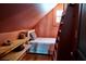 Bedroom featuring a cozy bed, built-in shelves, and creative decor at 10975 Hutcheson Ferry Rd, Chattahoochee Hills, GA 30268