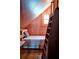 Bedroom featuring a cozy bed, built-in shelves, and creative decor at 10975 Hutcheson Ferry Rd, Chattahoochee Hills, GA 30268