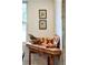 Corner in a farmhouse kitchen with a wooden table adorned with eggs, butternut squash and various decorations at 10975 Hutcheson Ferry Rd, Chattahoochee Hills, GA 30268
