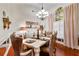 Formal dining room with chandelier and hardwood floors at 101 Constance Dr, Locust Grove, GA 30248