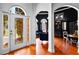 Elegant entryway with hardwood floors and stained glass door at 101 Constance Dr, Locust Grove, GA 30248