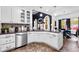 Bright kitchen with stainless steel appliances, white cabinets, and a cozy breakfast nook with modern finishes at 101 Constance Dr, Locust Grove, GA 30248
