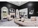 Spacious living room with fireplace and large windows at 101 Constance Dr, Locust Grove, GA 30248