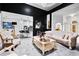 Elegant living room features stylish furnishings, modern decor, and an open floor plan with kitchen view at 101 Constance Dr, Locust Grove, GA 30248