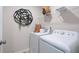 Laundry room with washer, dryer, and shelving for storage at 224 Maycrest Path, Tucker, GA 30084