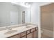 Double vanity bathroom with large mirror and tub at 822 Northam Ln, Atlanta, GA 30342