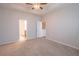 Primary bedroom with carpet, ceiling fan and en-suite bathroom at 822 Northam Ln, Atlanta, GA 30342