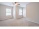 Bright bedroom with ceiling fan and neutral carpeting at 822 Northam Ln, Atlanta, GA 30342