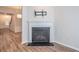 Modern gas fireplace with white mantel in living room at 822 Northam Ln, Atlanta, GA 30342