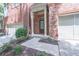 Inviting front entrance with brick facade and covered porch at 822 Northam Ln, Atlanta, GA 30342