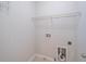 Laundry room with shelving and hook for hanging at 822 Northam Ln, Atlanta, GA 30342