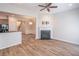Open living room with a fireplace and kitchen views at 822 Northam Ln, Atlanta, GA 30342