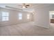 Large main bedroom with ceiling fan and carpet at 822 Northam Ln, Atlanta, GA 30342