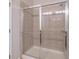 Large walk-in shower with glass enclosure and tile surround at 822 Northam Ln, Atlanta, GA 30342