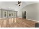 Living room with hardwood floors, vaulted ceilings and access to deck at 1483 Hidden Hills Pkwy, Stone Mountain, GA 30088